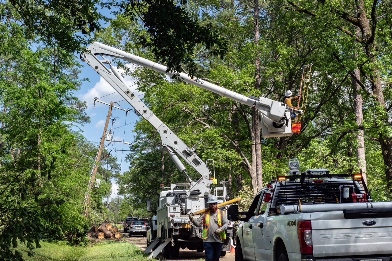 Lineworkers making repairs at the corner of E. Ridge Road and E. Northside Drive in Jackson, Mississippi